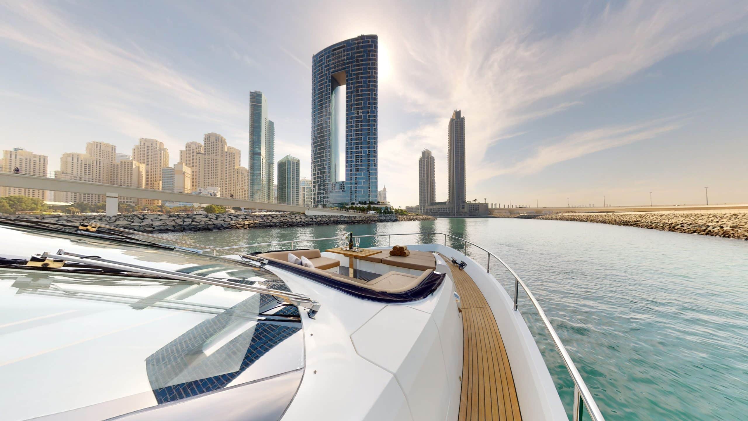 Galeon 780 F1 luxury yacht front deck with city skyline view