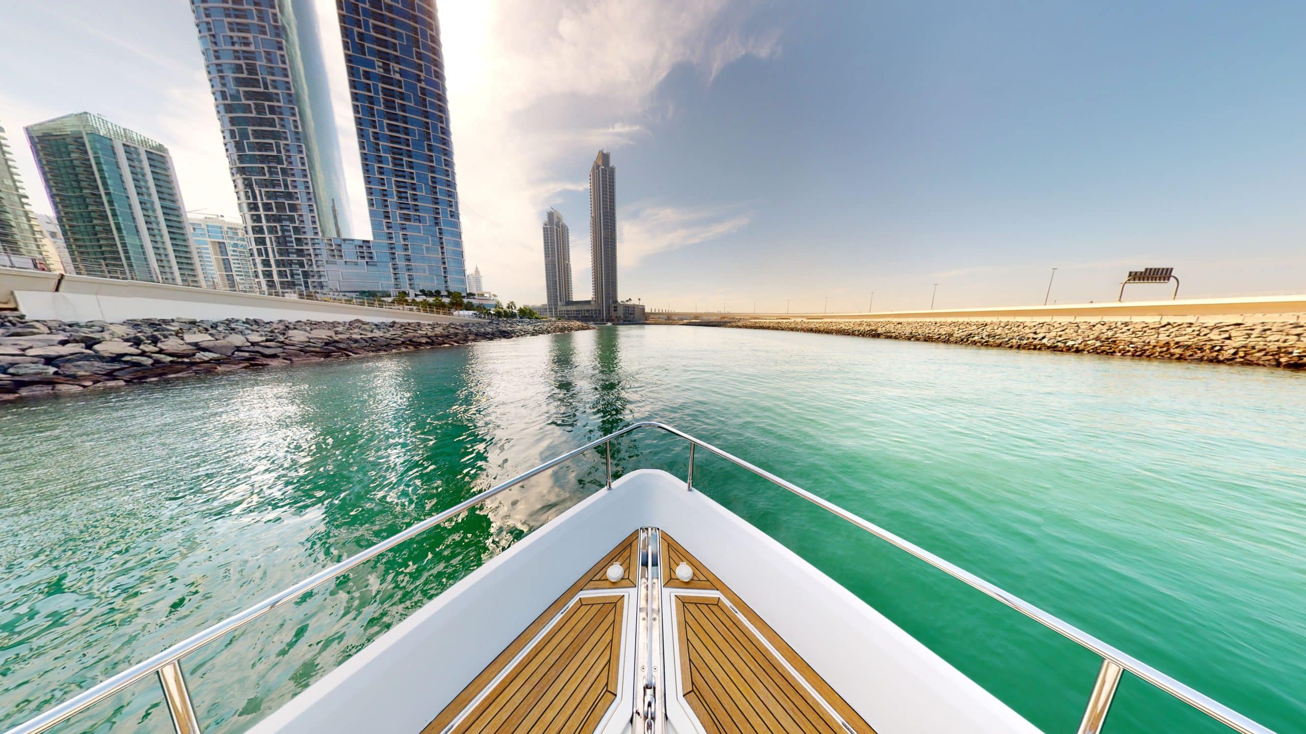Galeon 780 F1 luxury yacht bow deck with teak flooring and open sea view