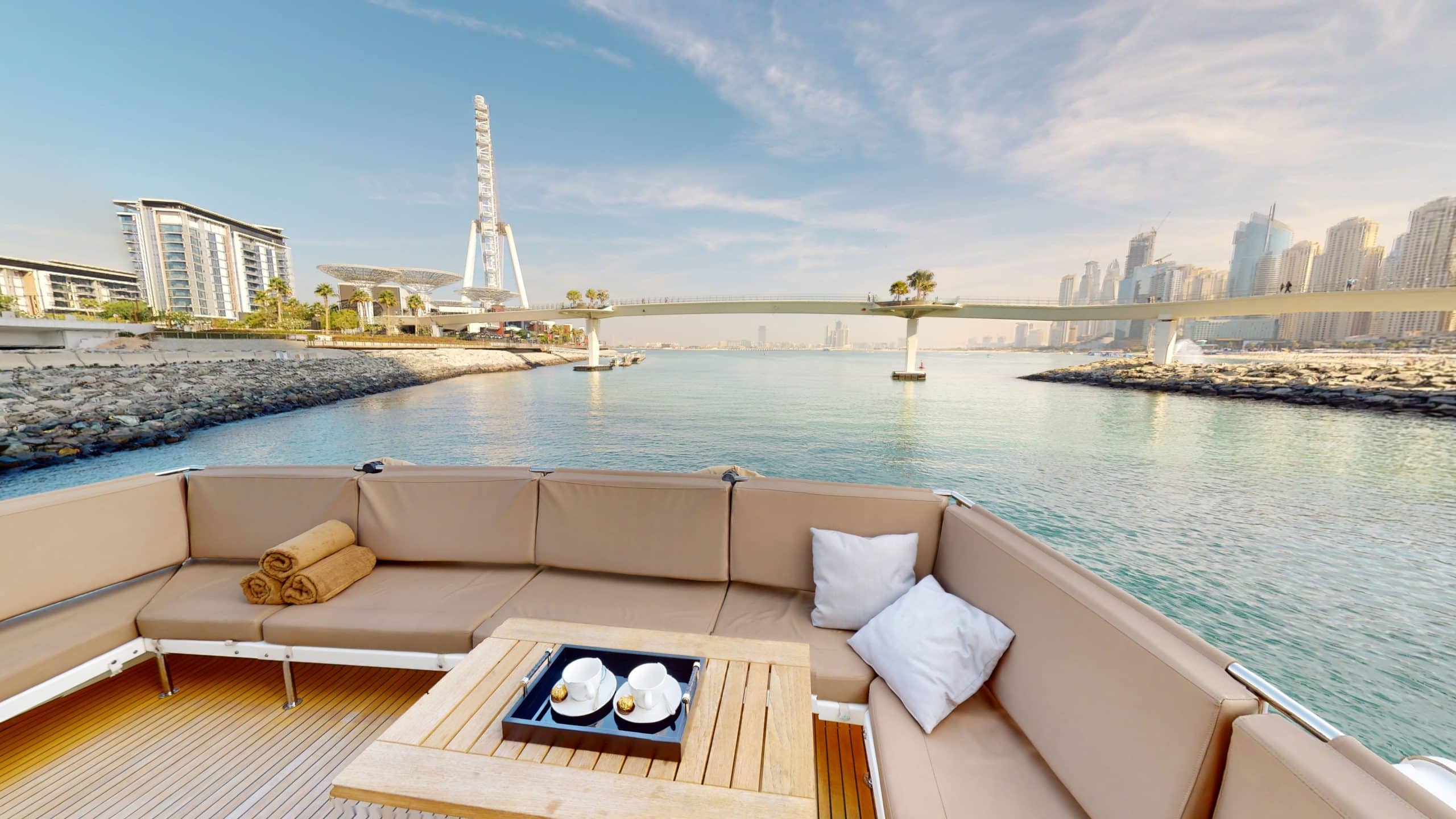Galeon 780 F1 yacht flybridge lounge area with luxury seating and waterfront view