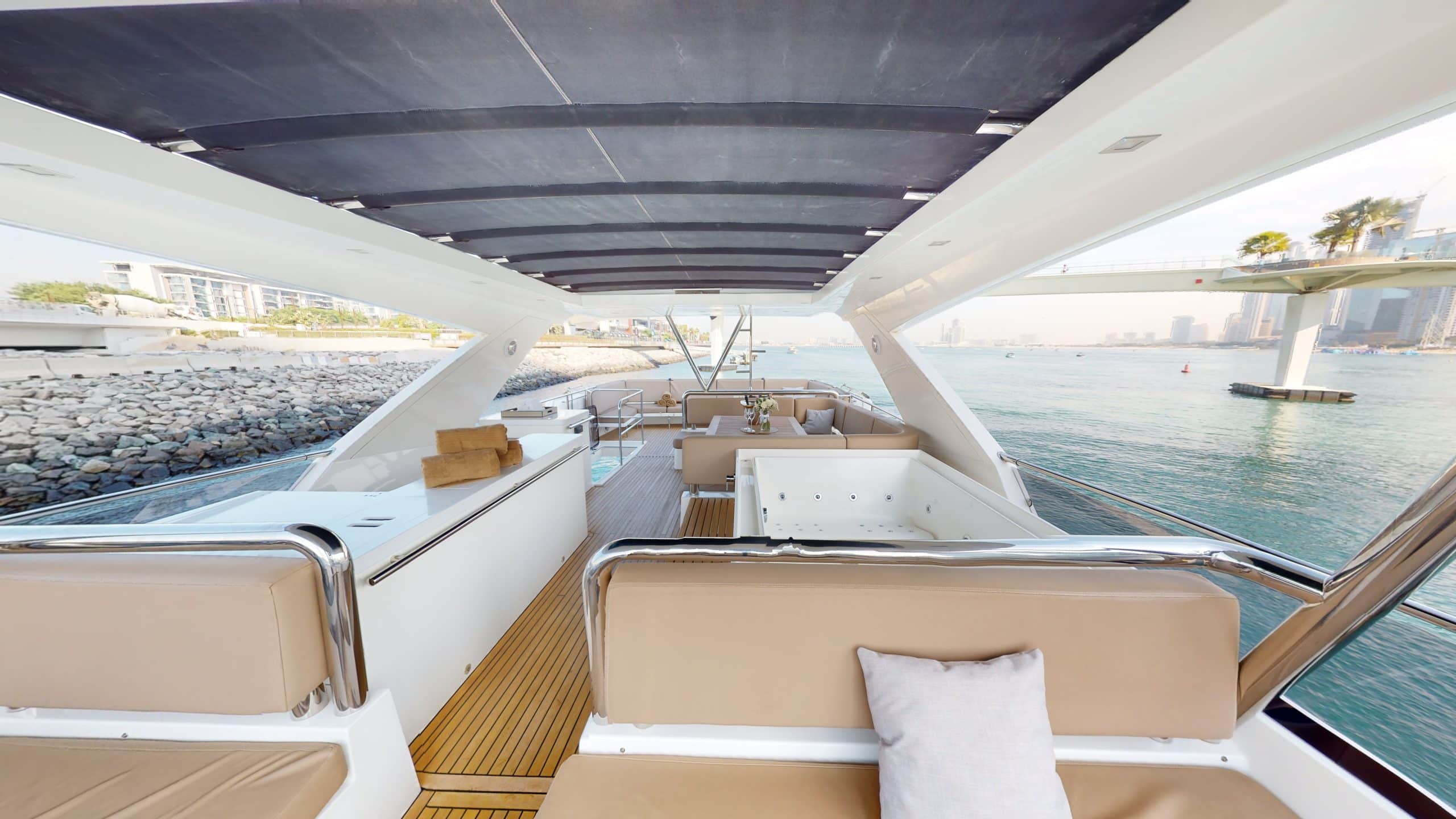 Galeon 780 F1 luxury yacht rear seating lounge with premium cushions and teak deck