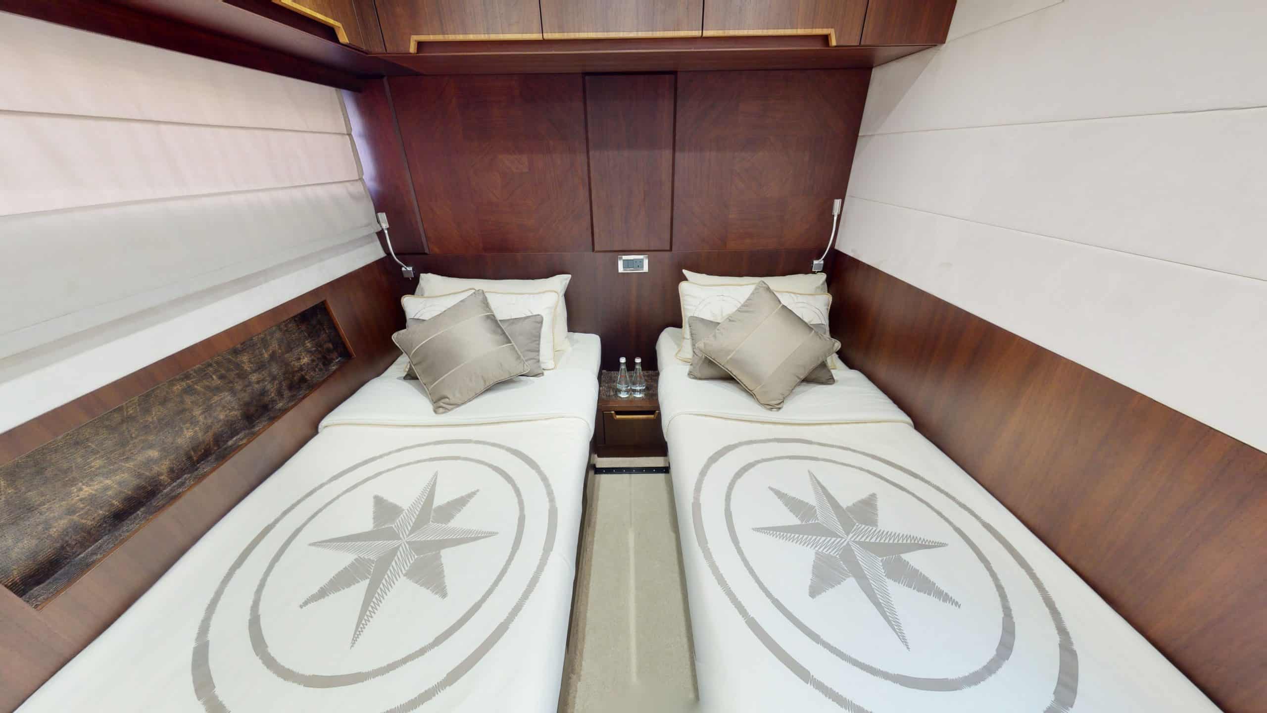 Galeon 780 F1 luxury yacht twin guest cabin with premium bedding and modern interior