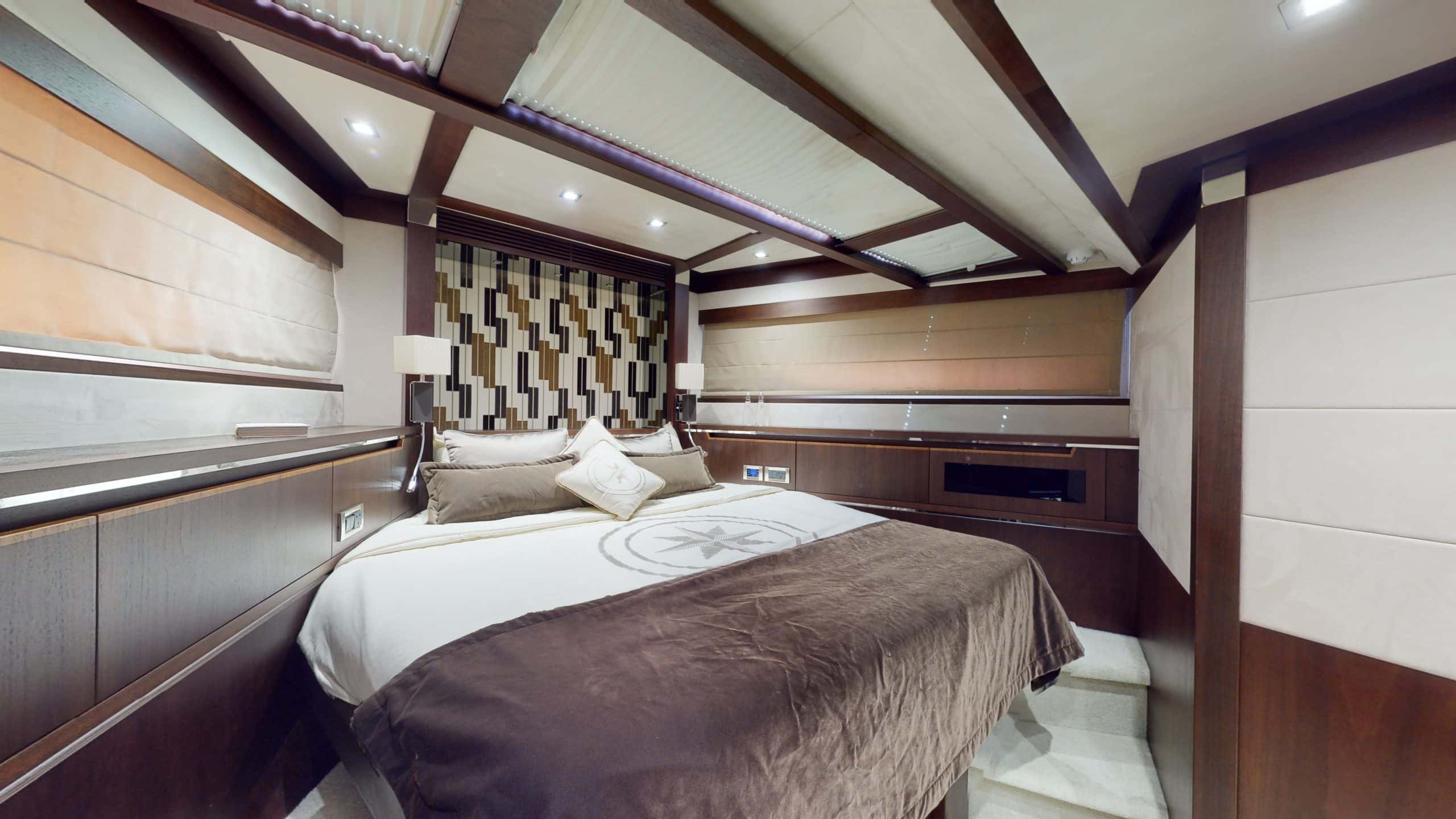 Galeon 780 F1 luxury yacht master cabin side view with luxury decor and wood interiors