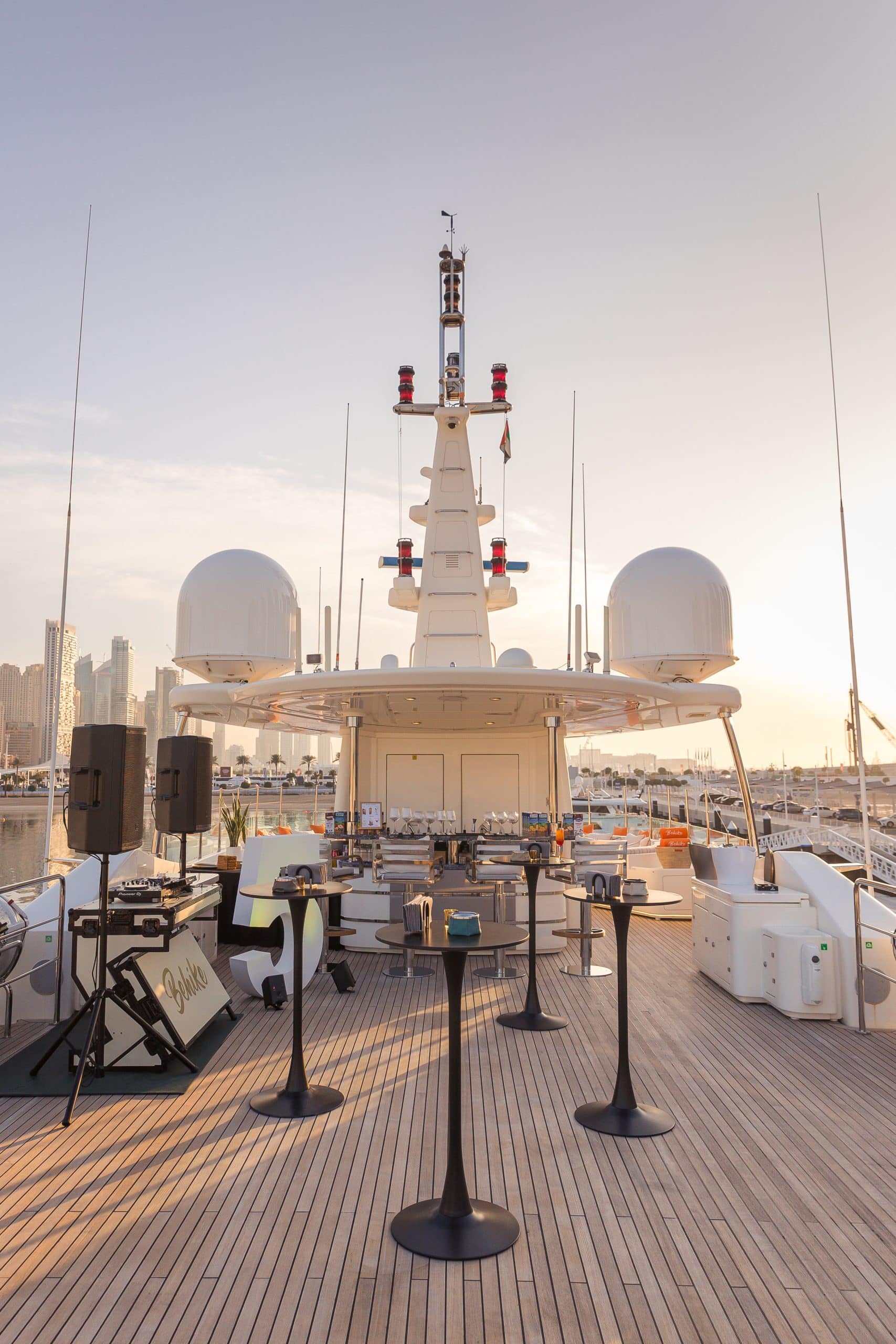 Outdoor entertainment deck on MILA 141 with bar and lounge seating
