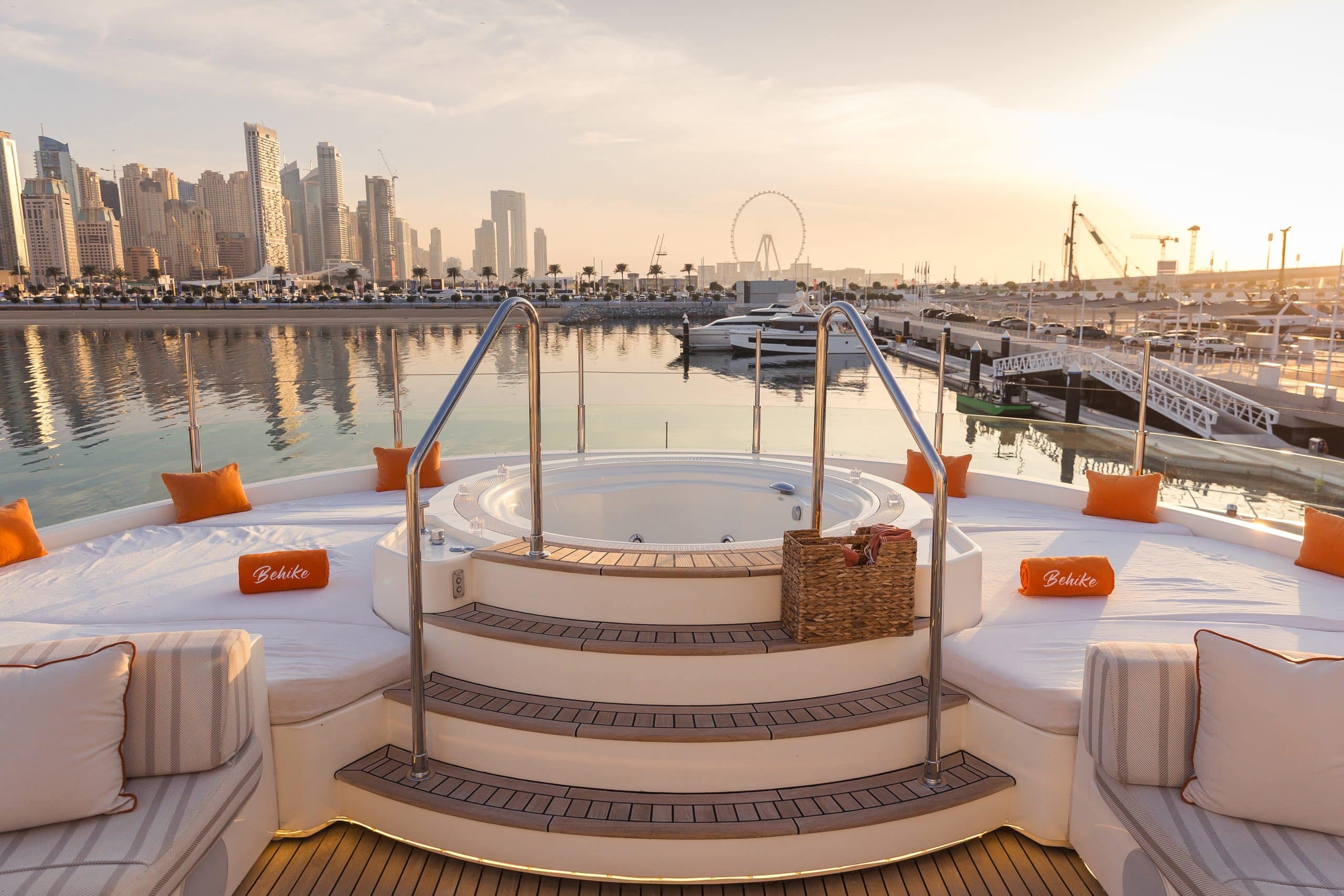 Jacuzzi on the upper deck of MILA 141 yacht with Abu Dhabi skyline views