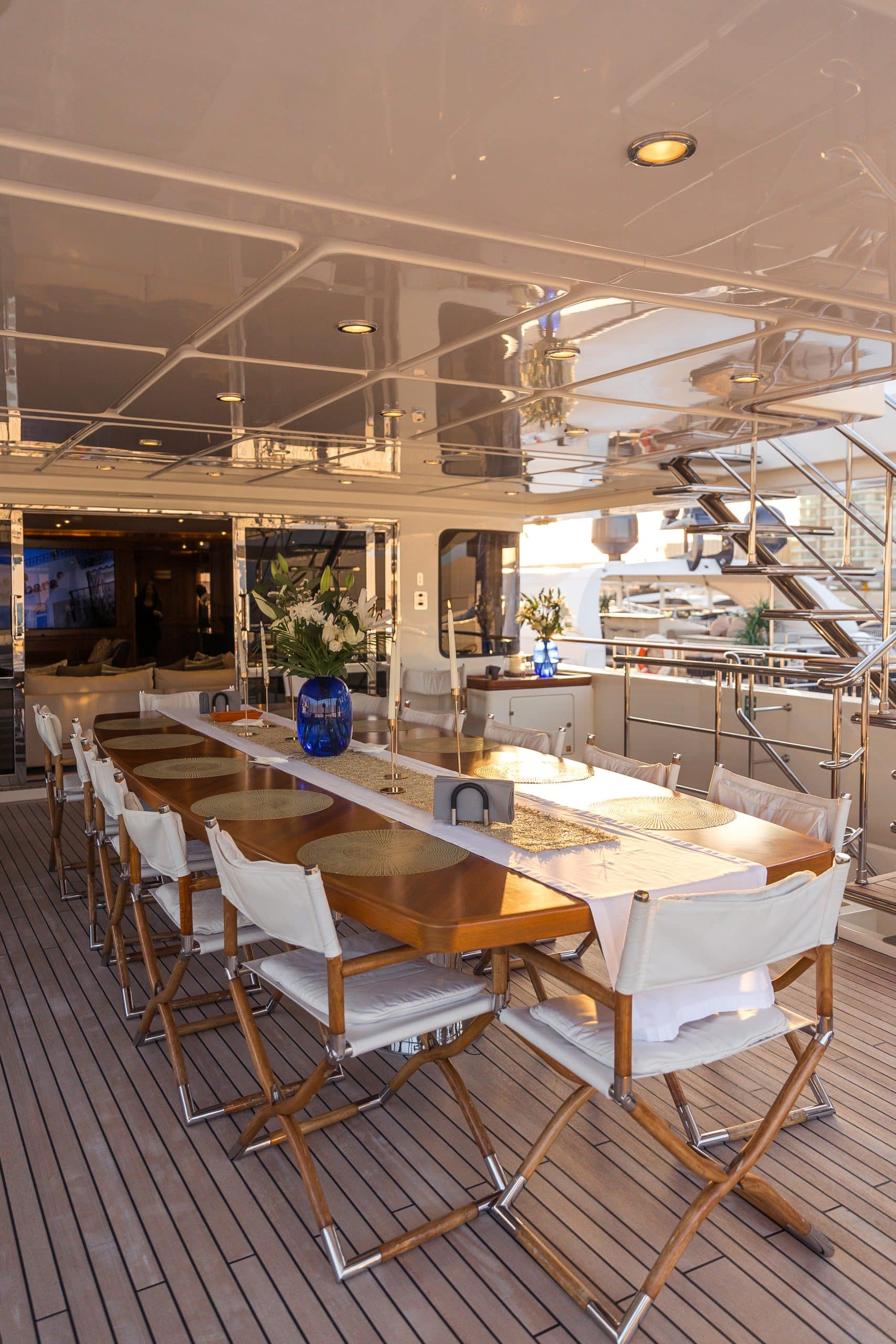 Formal indoor dining table setup inside MILA 141 yacht