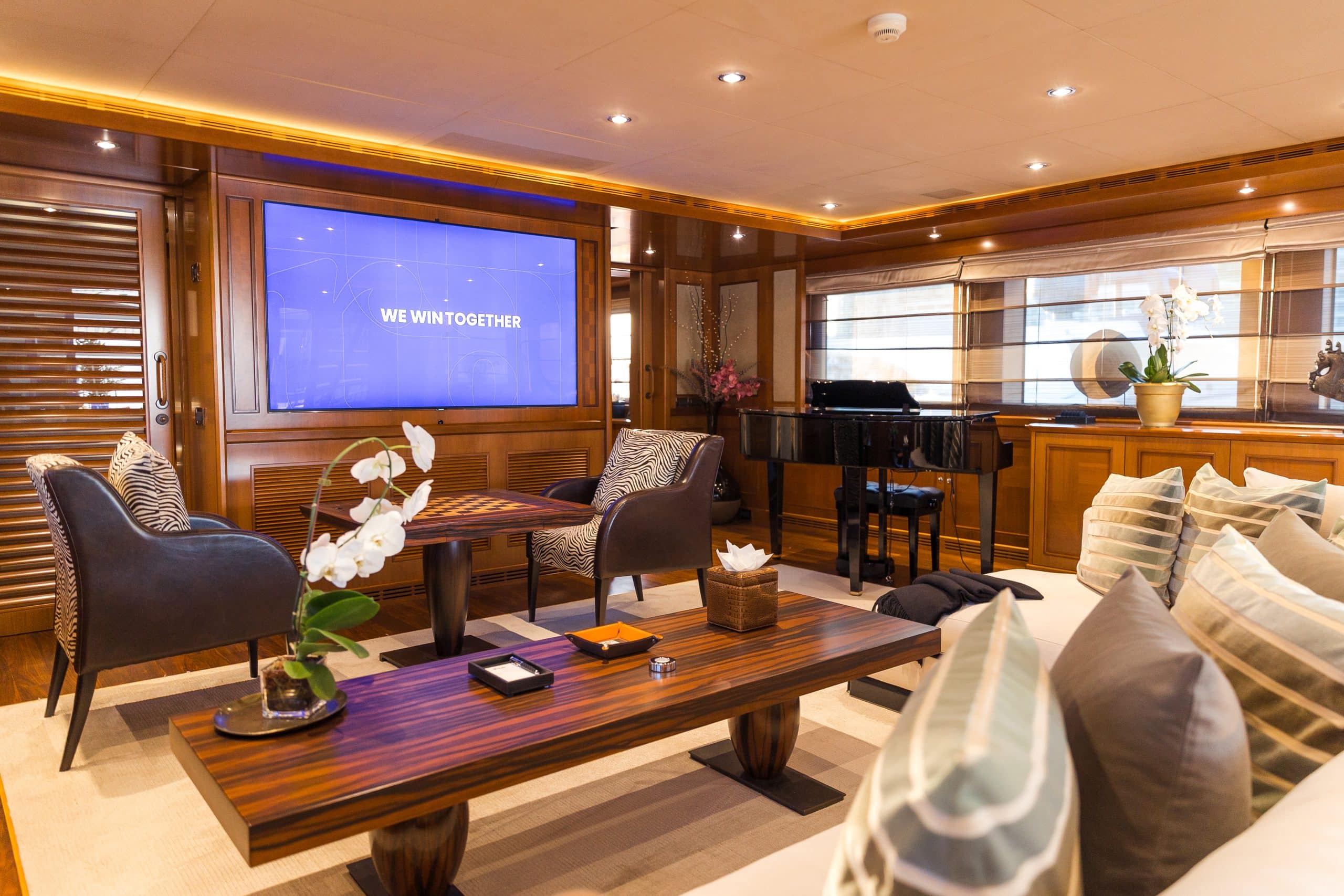 Private cinema and entertainment lounge inside MILA 141 yacht