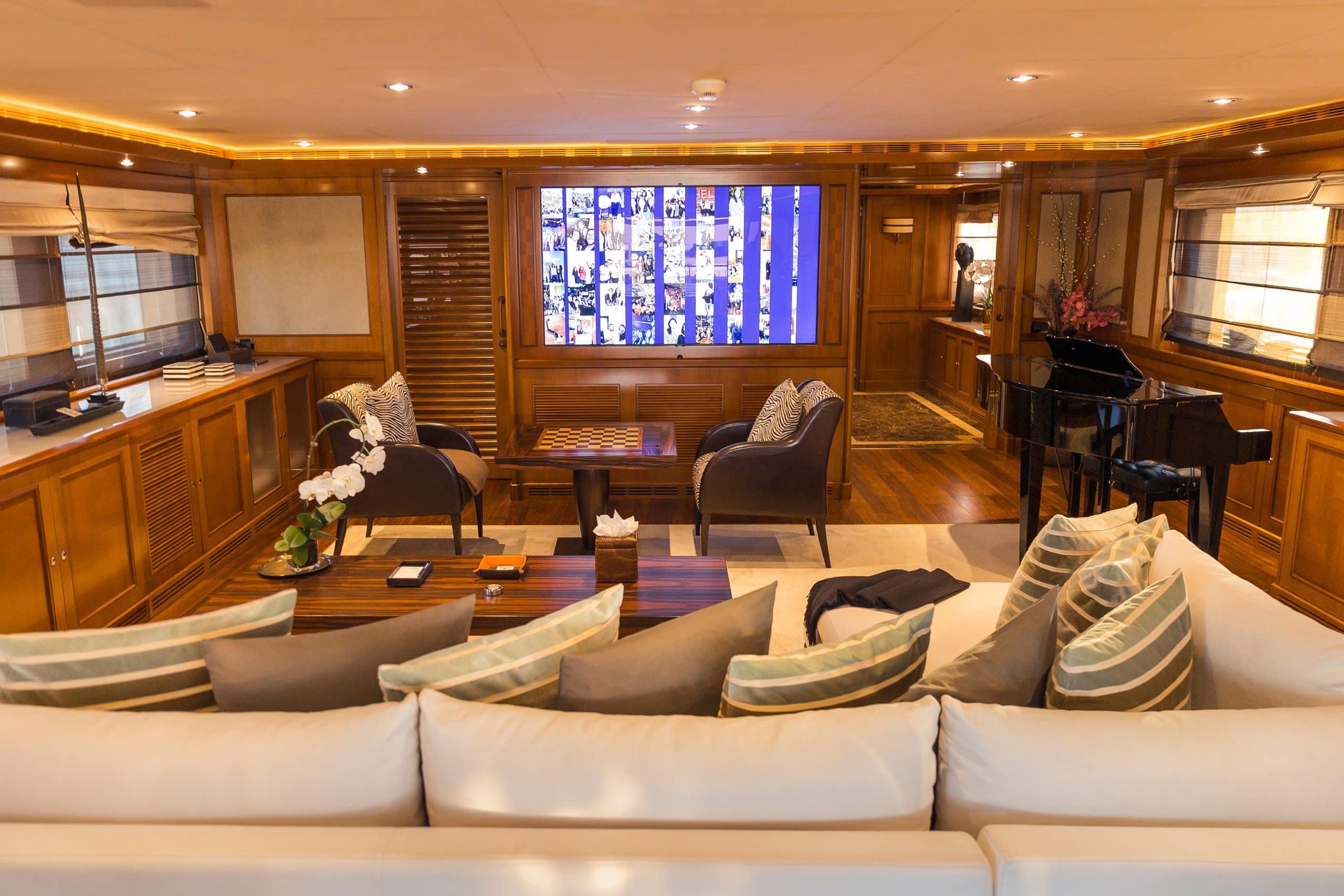 Elegant main salon lounge with plush seating onboard MILA 141 yacht