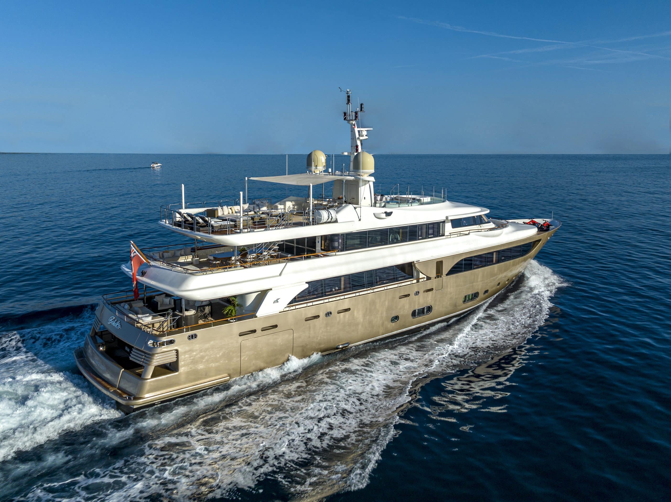 Aerial view of MILA 141 superyacht cruising at speed in the Arabian Gulf