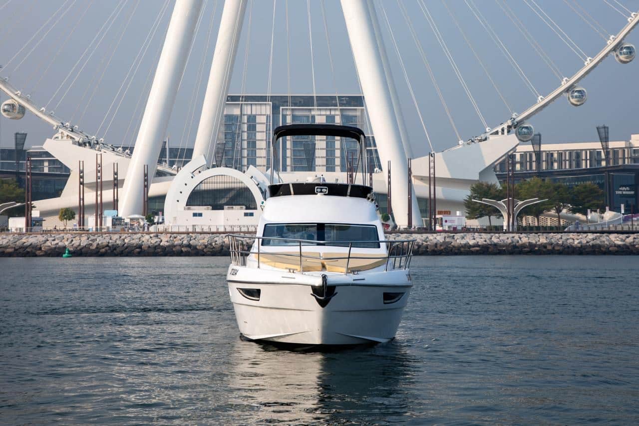 Elan 44 sailing yacht front view near Abu Dhabi marina landmark