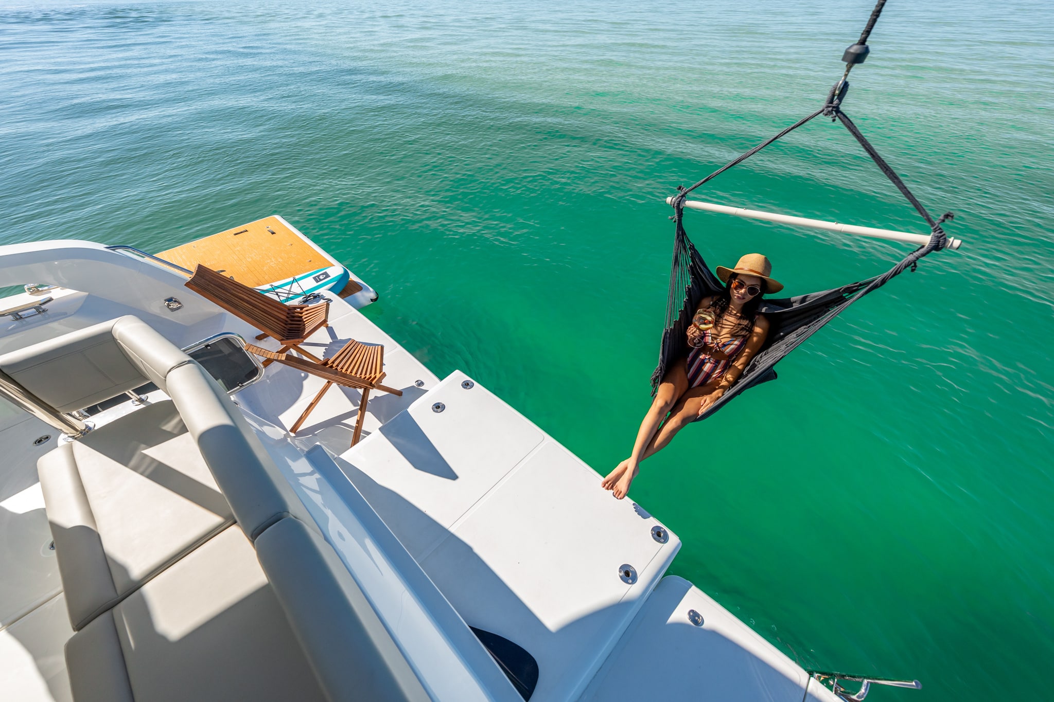 Aquila 42 foredeck sunpad and bow hammock from above, shipyard photo
