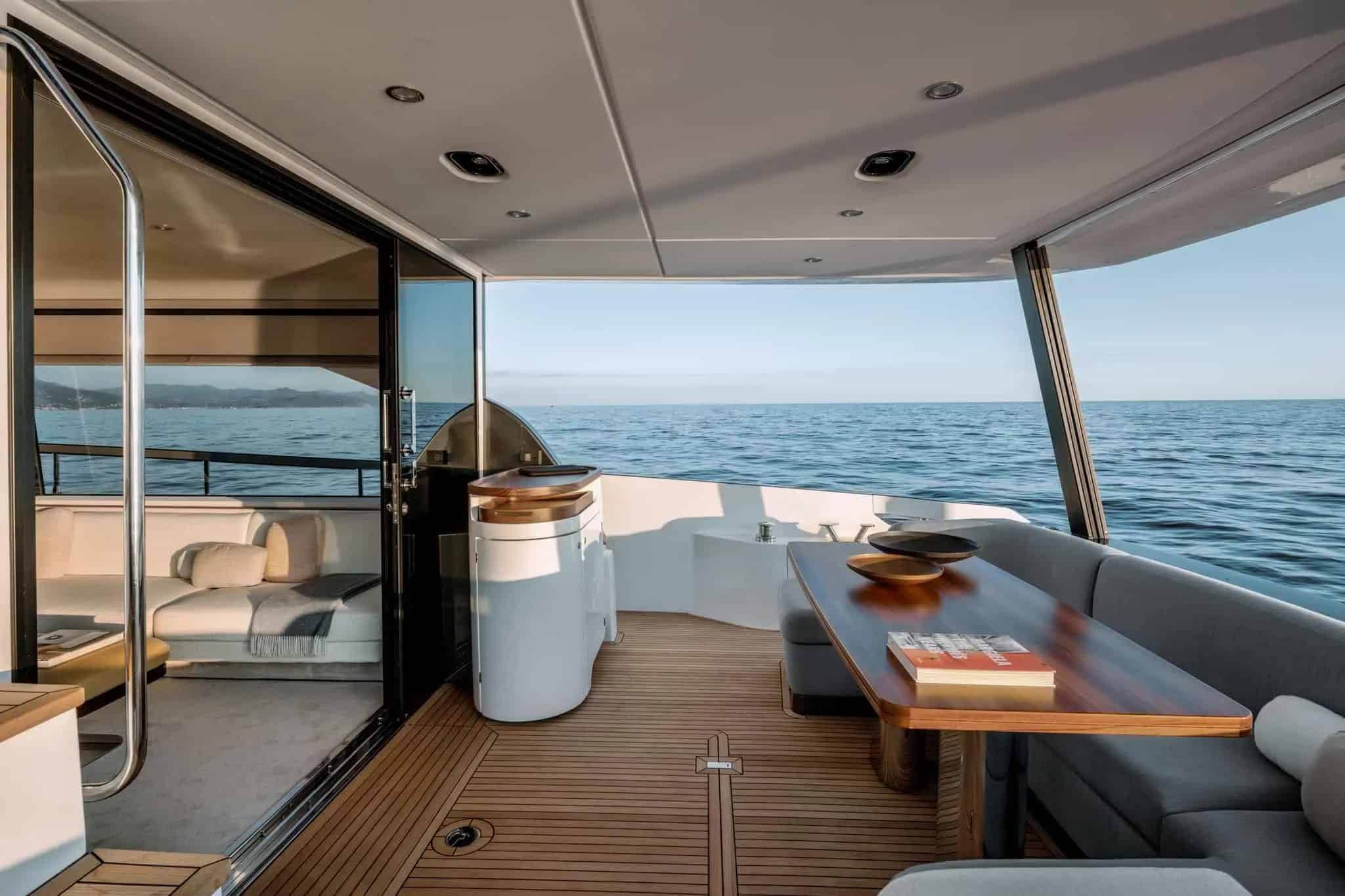 Azimut Fly 68 cockpit with teak dining table — shipyard photo
