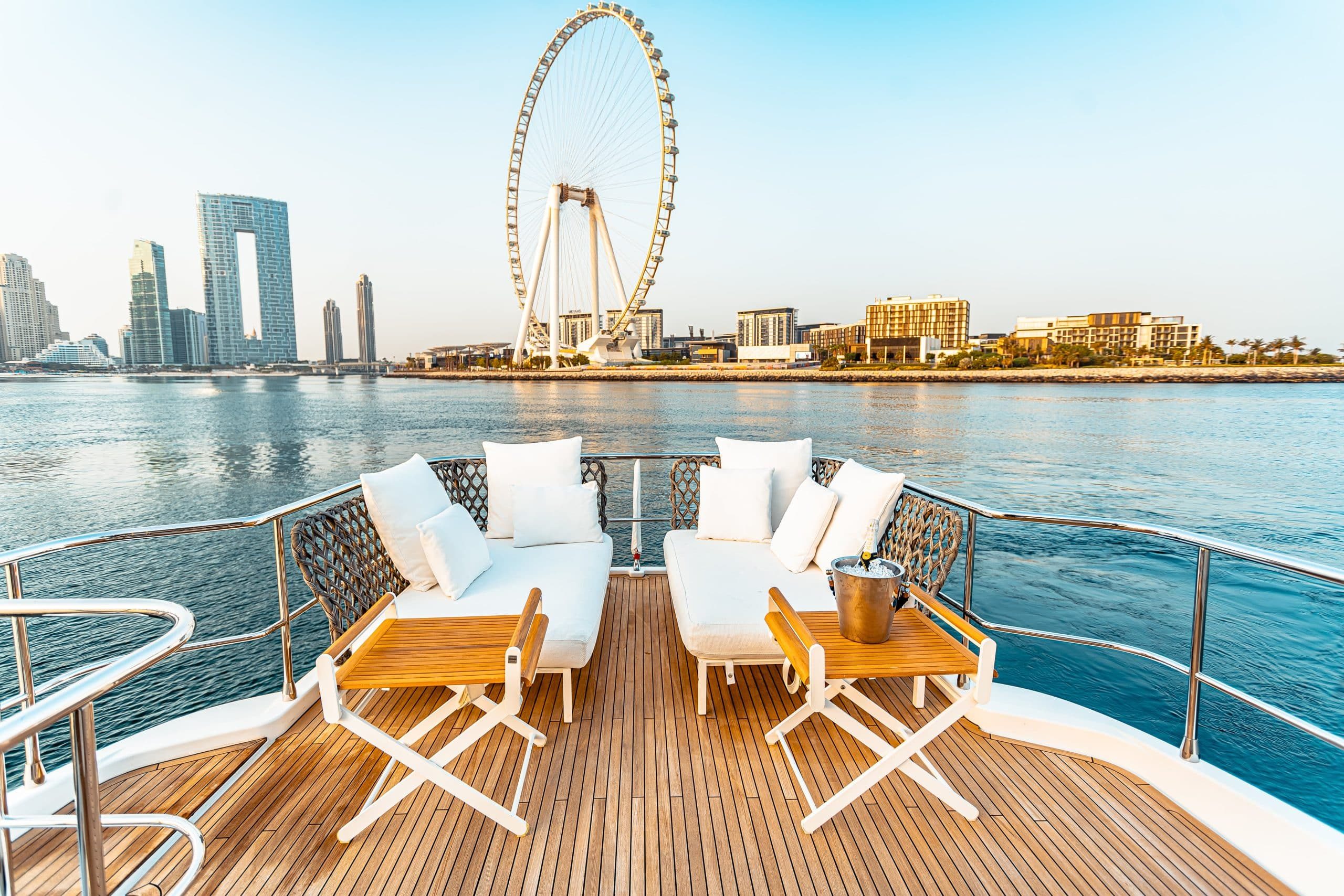Azimut Magellano 66 flybridge aft deck lounge facing Ain Dubai