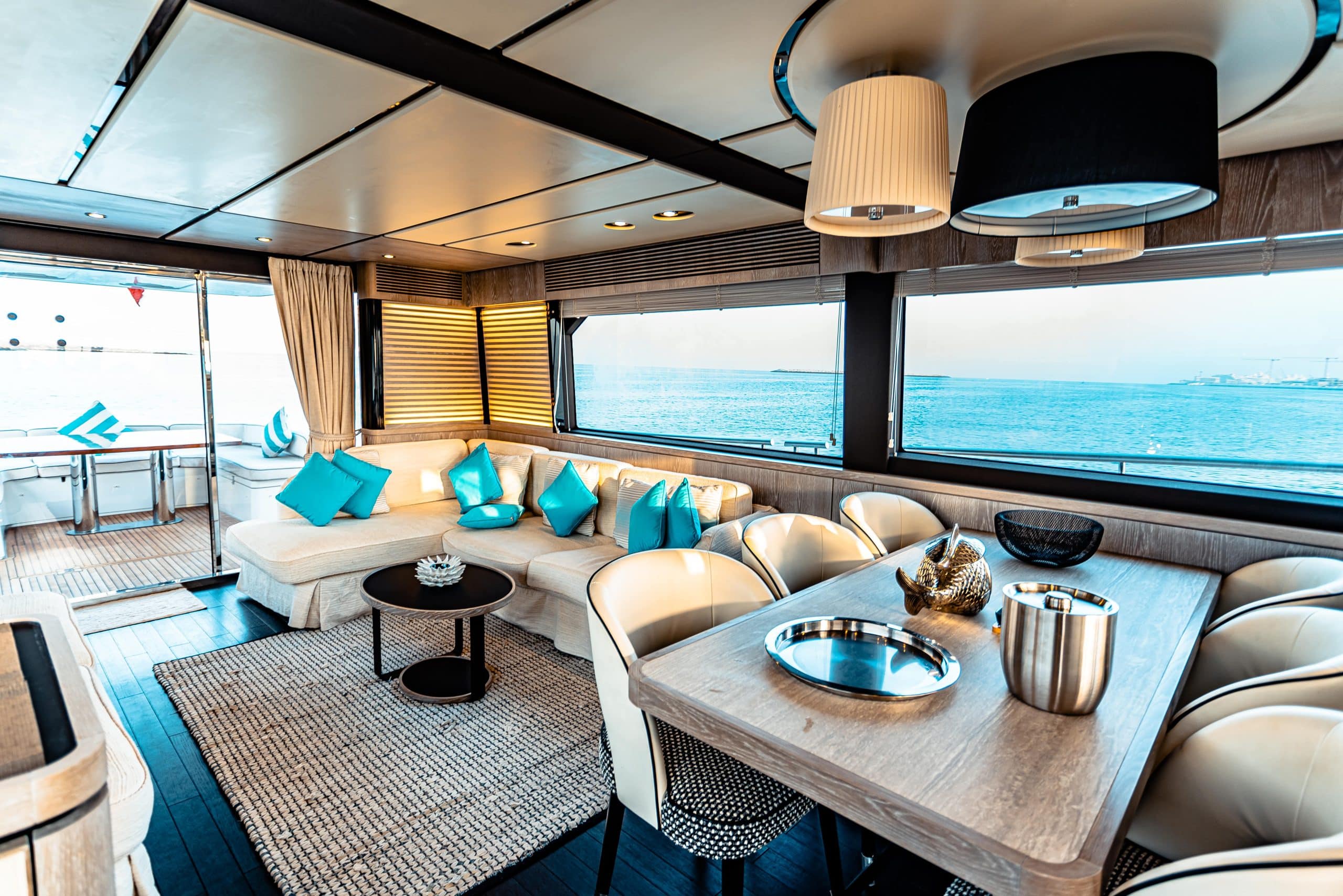 Azimut Magellano 66 saloon dining area with panoramic sea views