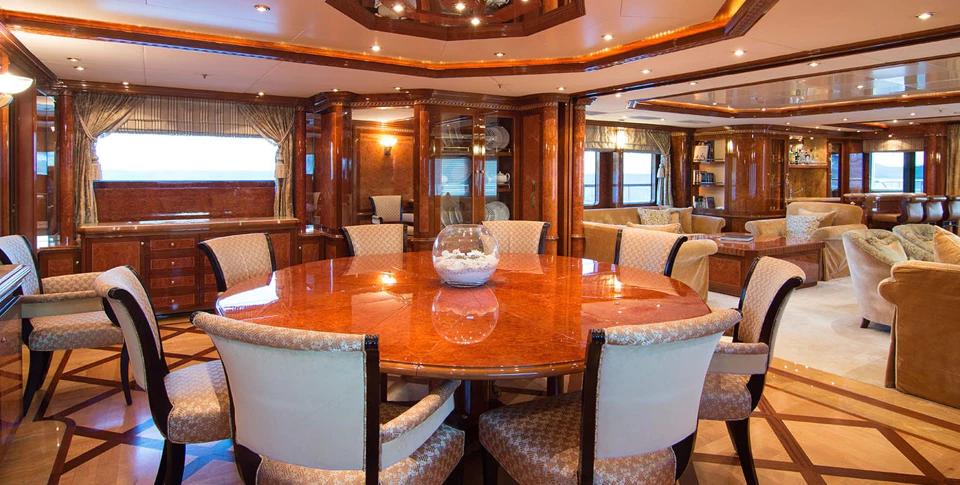 Benetti 56M formal dining room with round table and chandelier