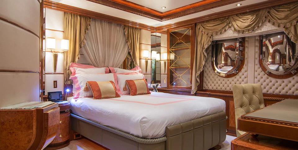 Benetti 56M guest double cabin with soft upholstered wall panels