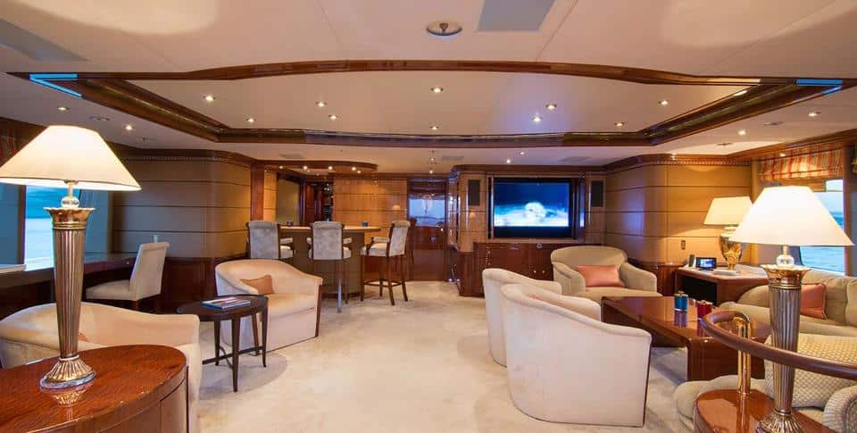 Benetti 56M main saloon lounge with television and table lamps