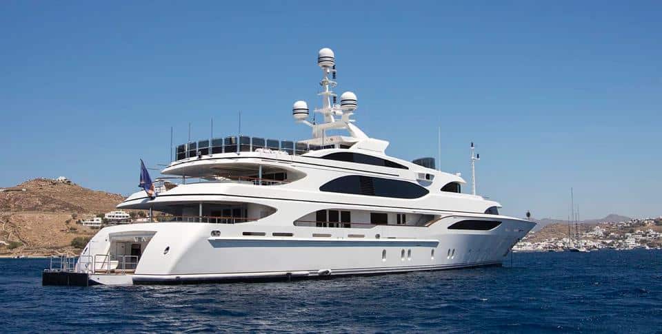 Benetti 56M stern three-quarter view at anchor off the coast