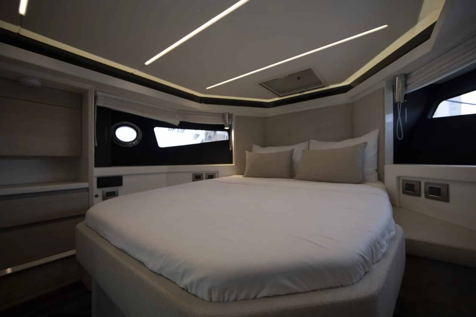 Cranchi 52 Evoluzione master cabin with vanity and warm lighting