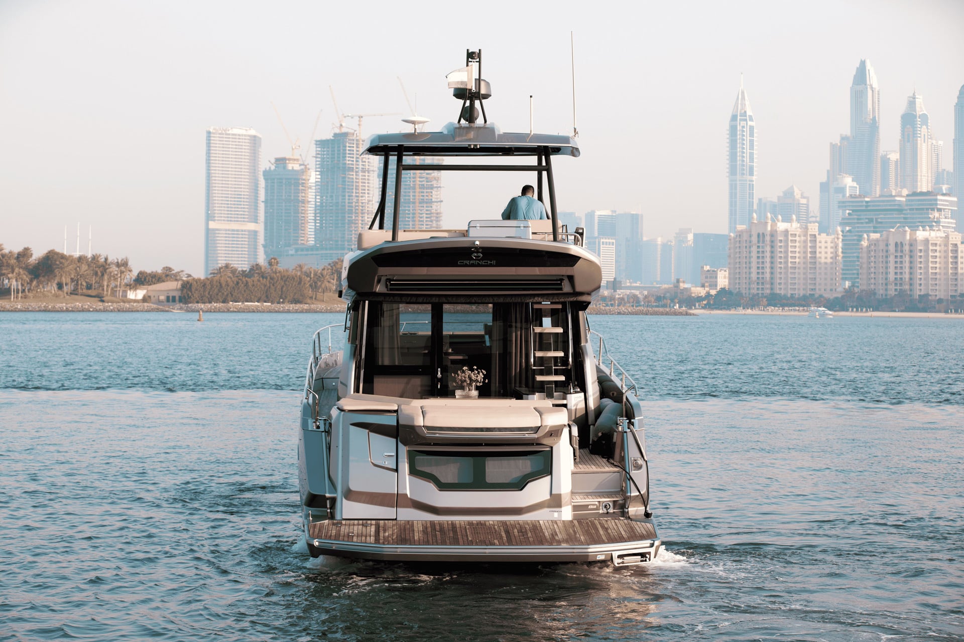 Cranchi 52 Evoluzione stern view underway with wake astern