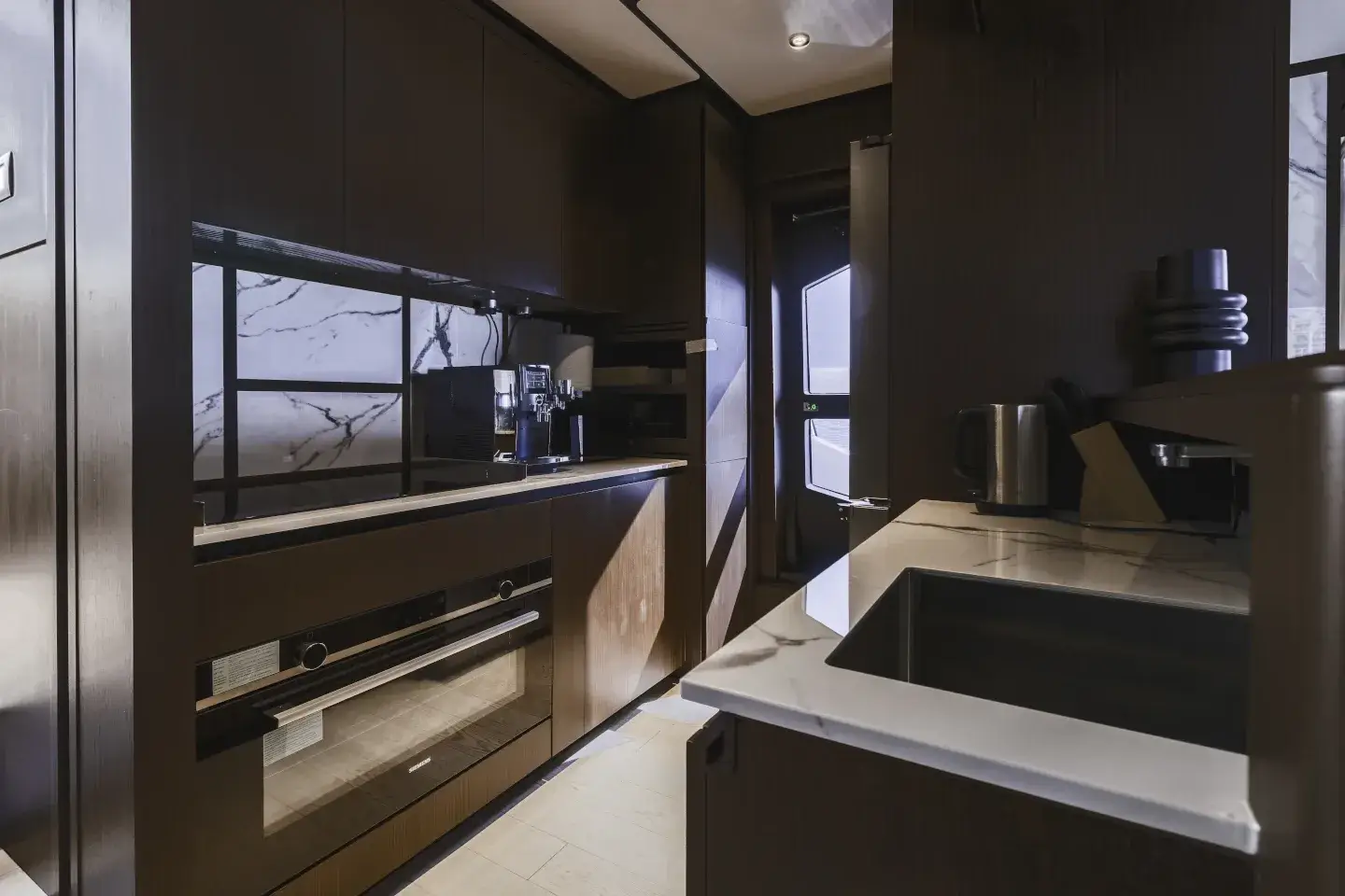 Fully equipped galley with coffee bar aboard the Ferretti 860