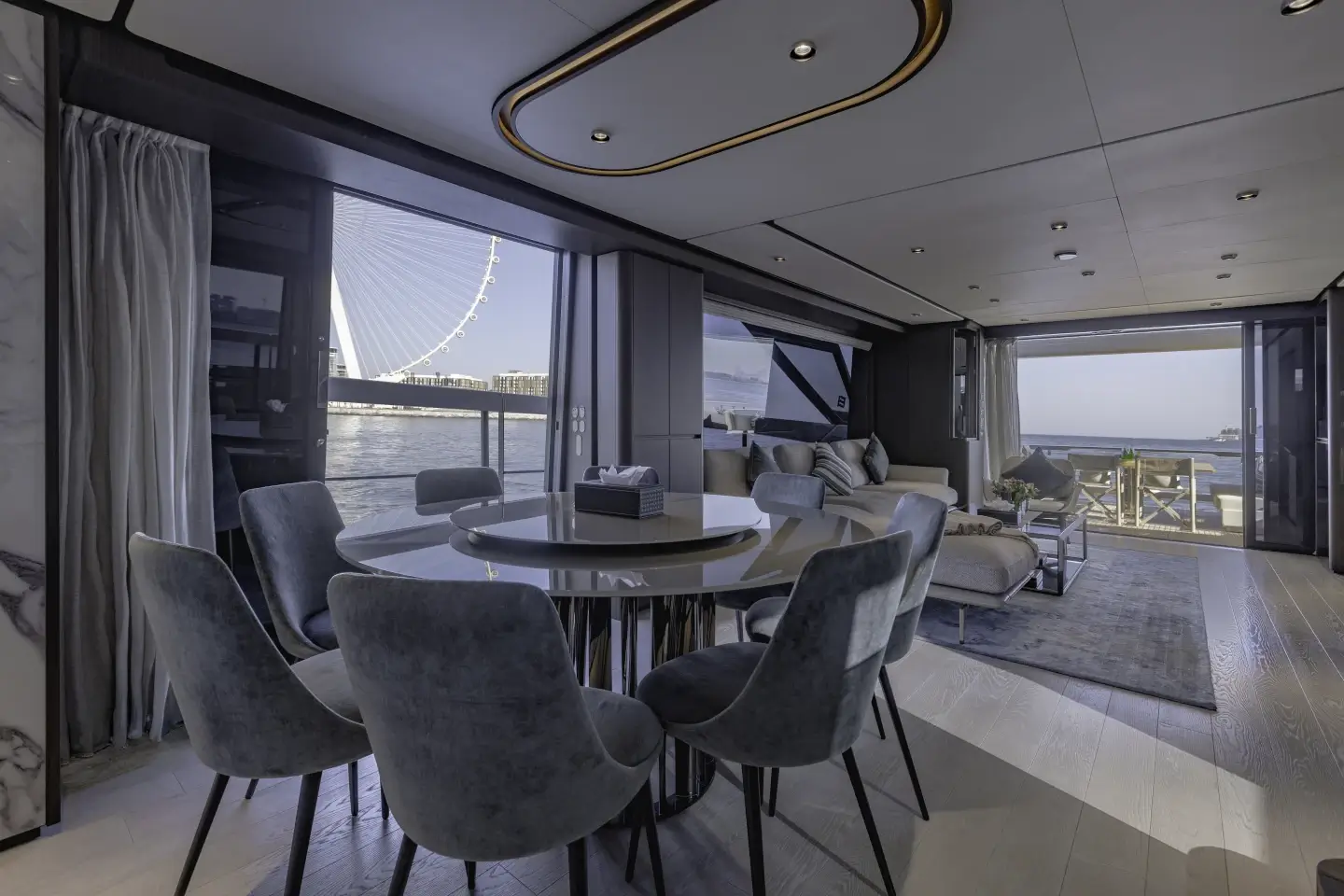 Formal dining area with sea views aboard the Ferretti 860