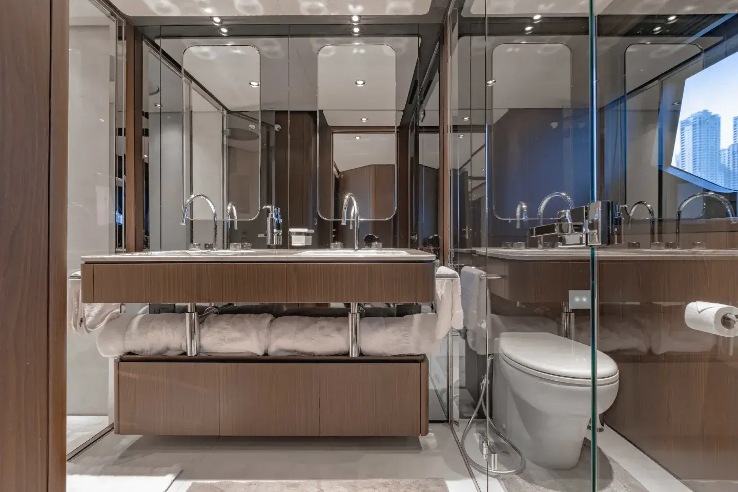Marble master ensuite with rain shower aboard Ferretti 860