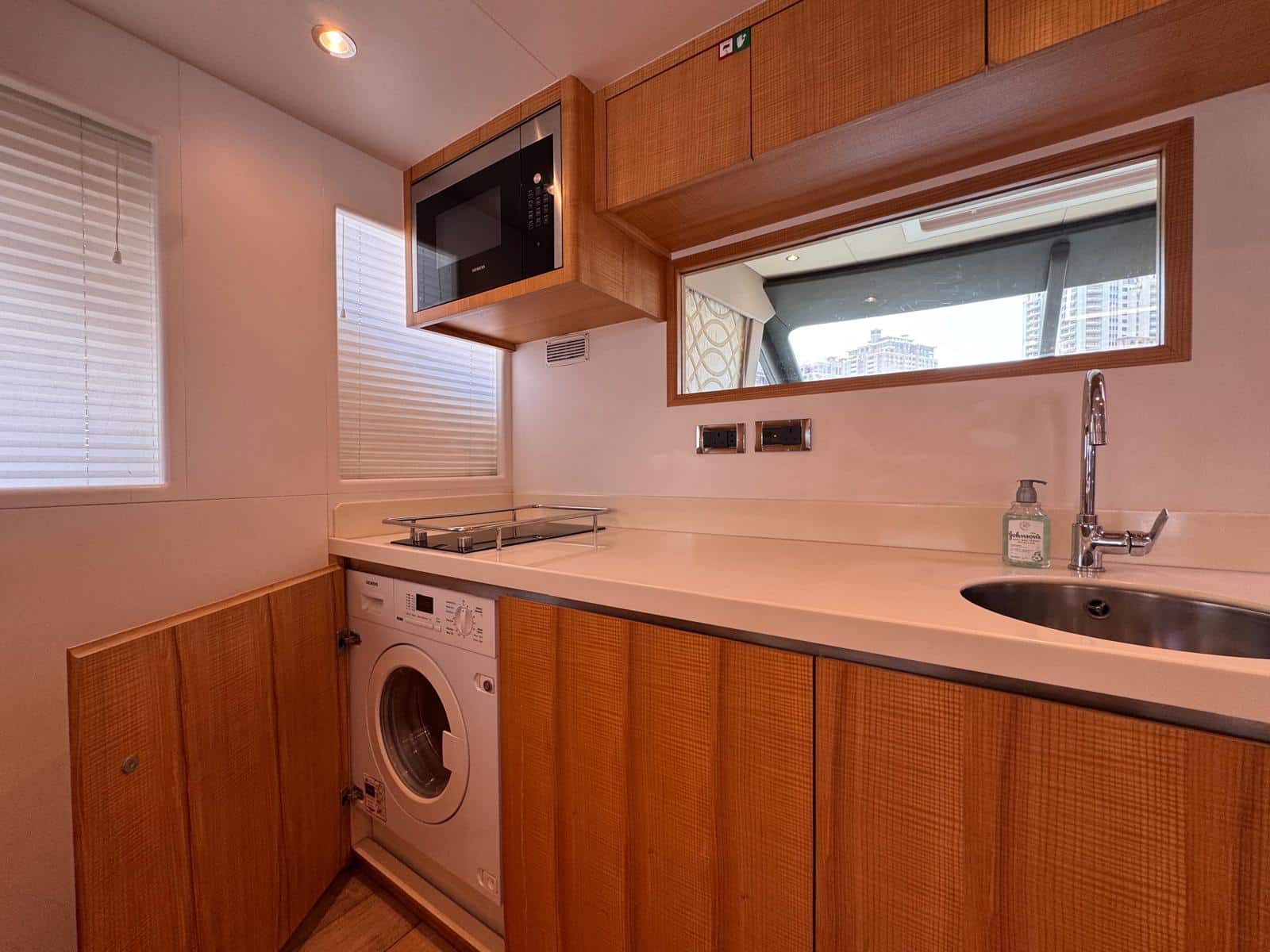 Nomad 65 galley counter with washer, microwave and sink