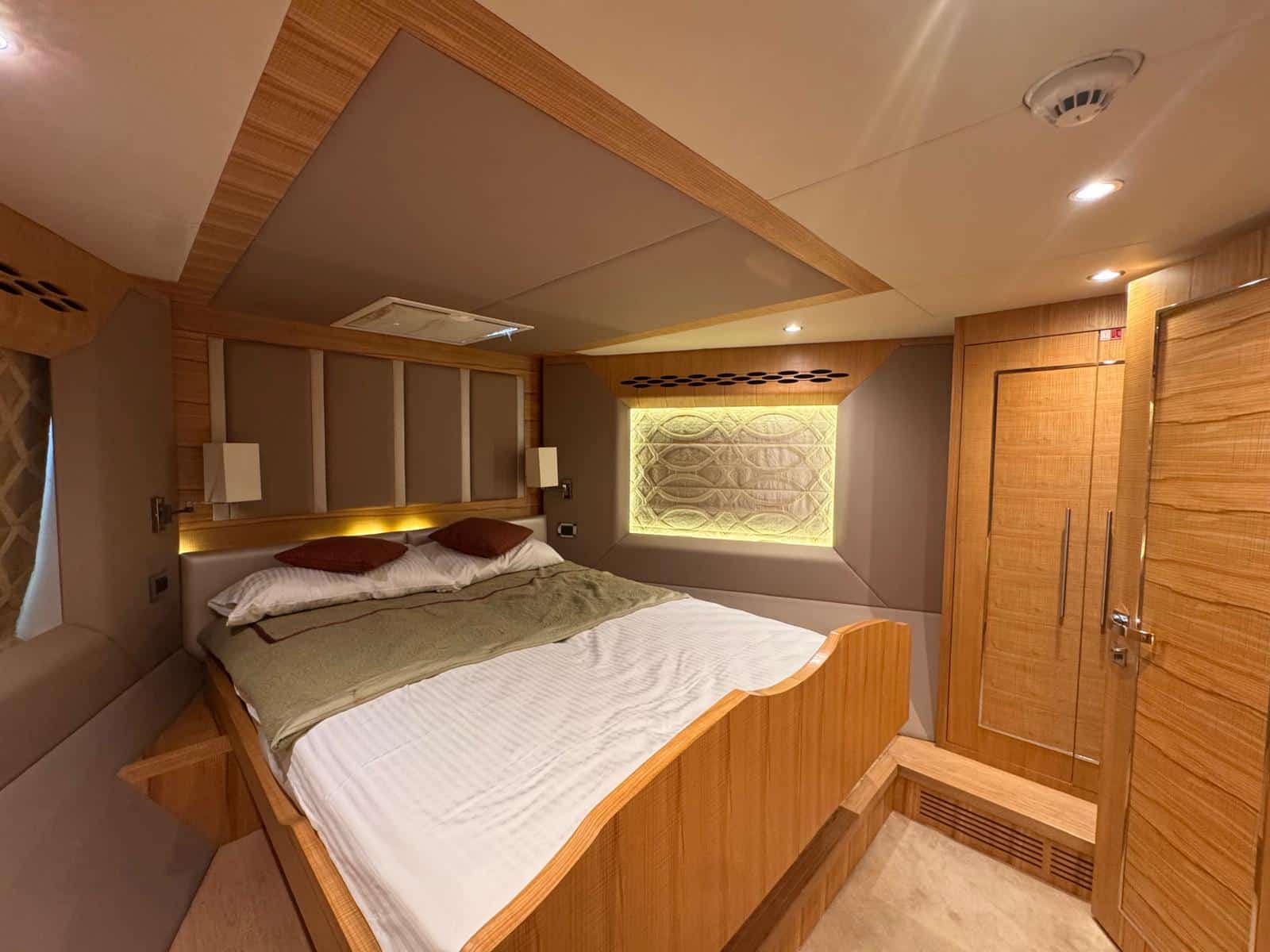 Nomad 65 forward VIP double cabin with backlit headboard