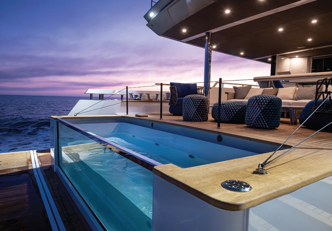 Numarine 40MXP aft deck pool glowing at dusk — shipyard photo