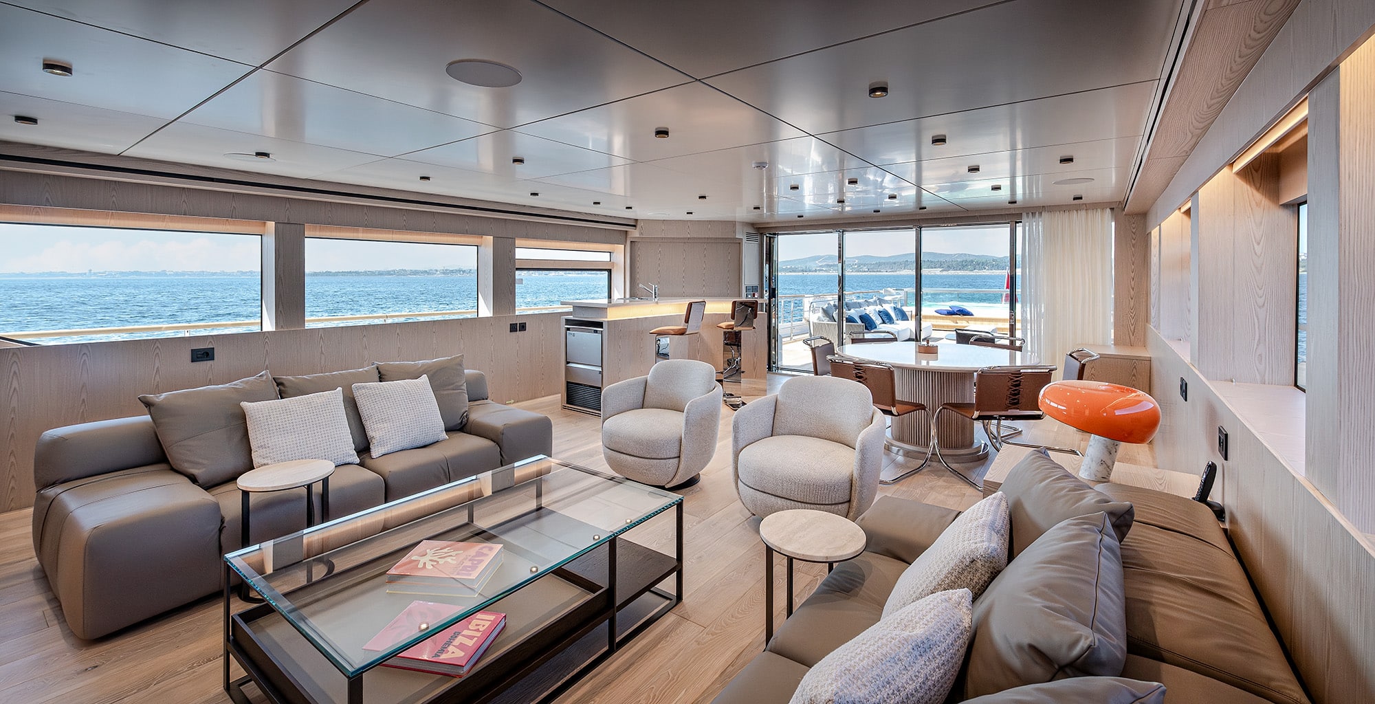 Numarine 40MXP sky lounge with corner sofas and dining table