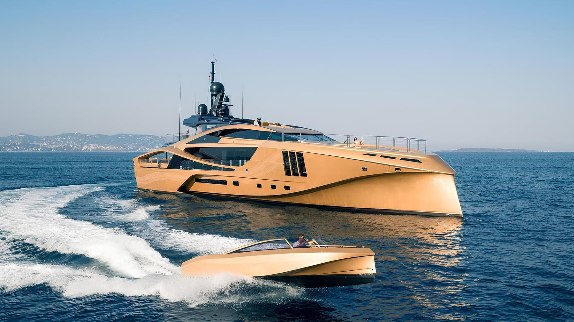 SuperSport 48 running offshore with her gold tender alongside