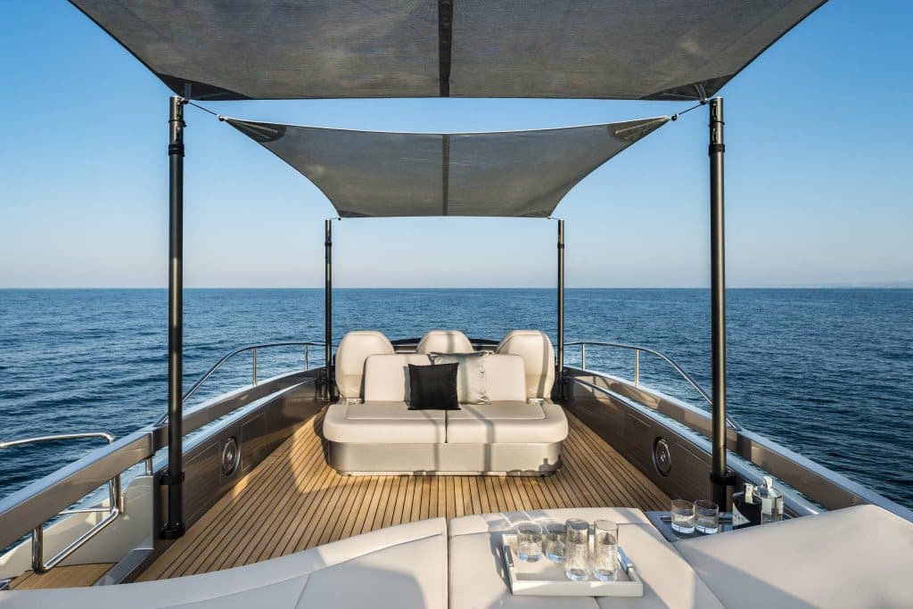 Pershing 8X flybridge lounge under sunshade — shipyard photo