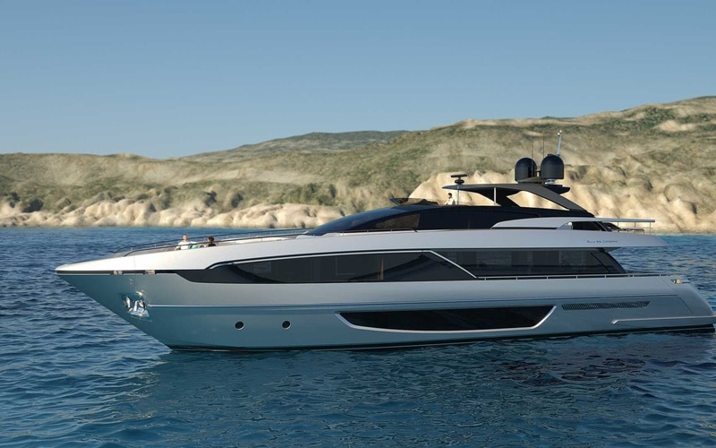 Riva 100 Corsaro port profile at anchor, official shipyard photo