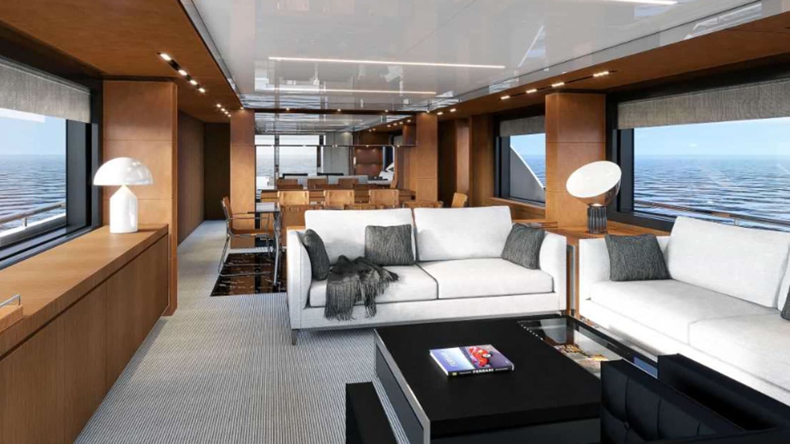 Riva 100 Corsaro saloon lounge in warm oak, official shipyard photo