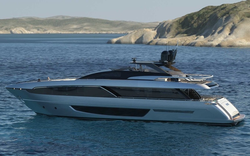 Riva 100 Corsaro stern quarter at anchor, official shipyard photo