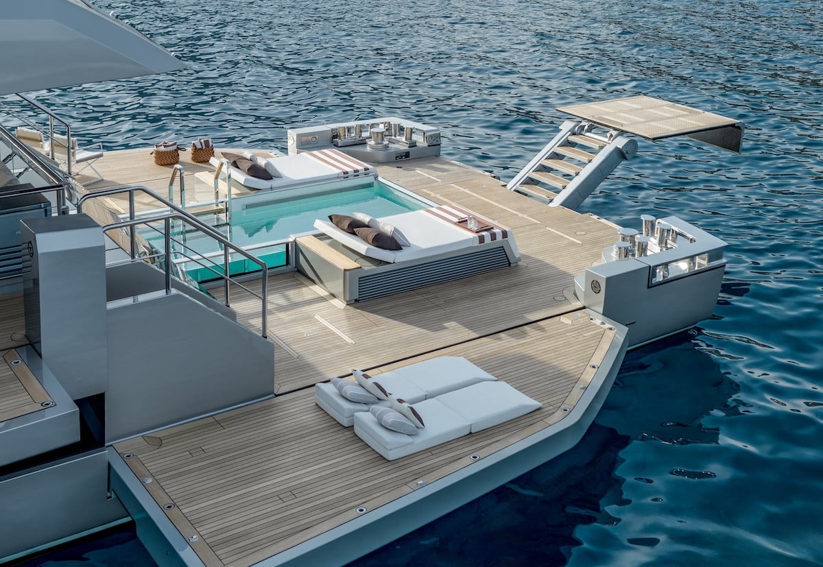 Riva 54Metri beach club with glass-edged pool, broker photo
