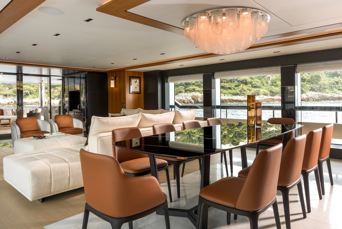 Riva 54Metri salon dining area with hull windows, broker photo