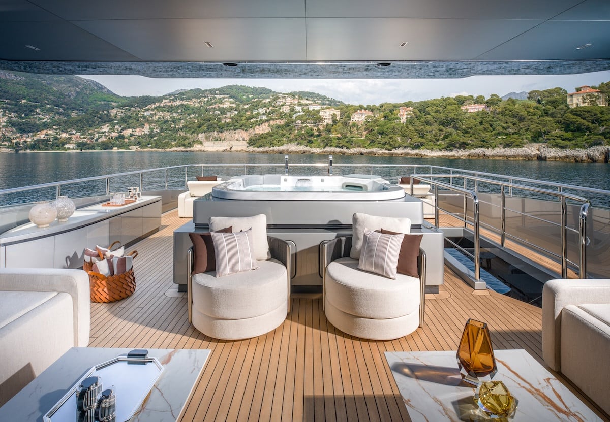 Riva 54Metri sundeck jacuzzi and bar with coastal view, broker photo