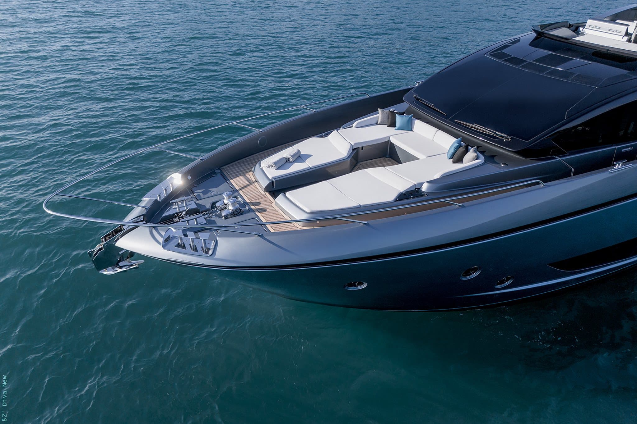 Riva 82 Diva bow aerial with foredeck sunpads and seating group