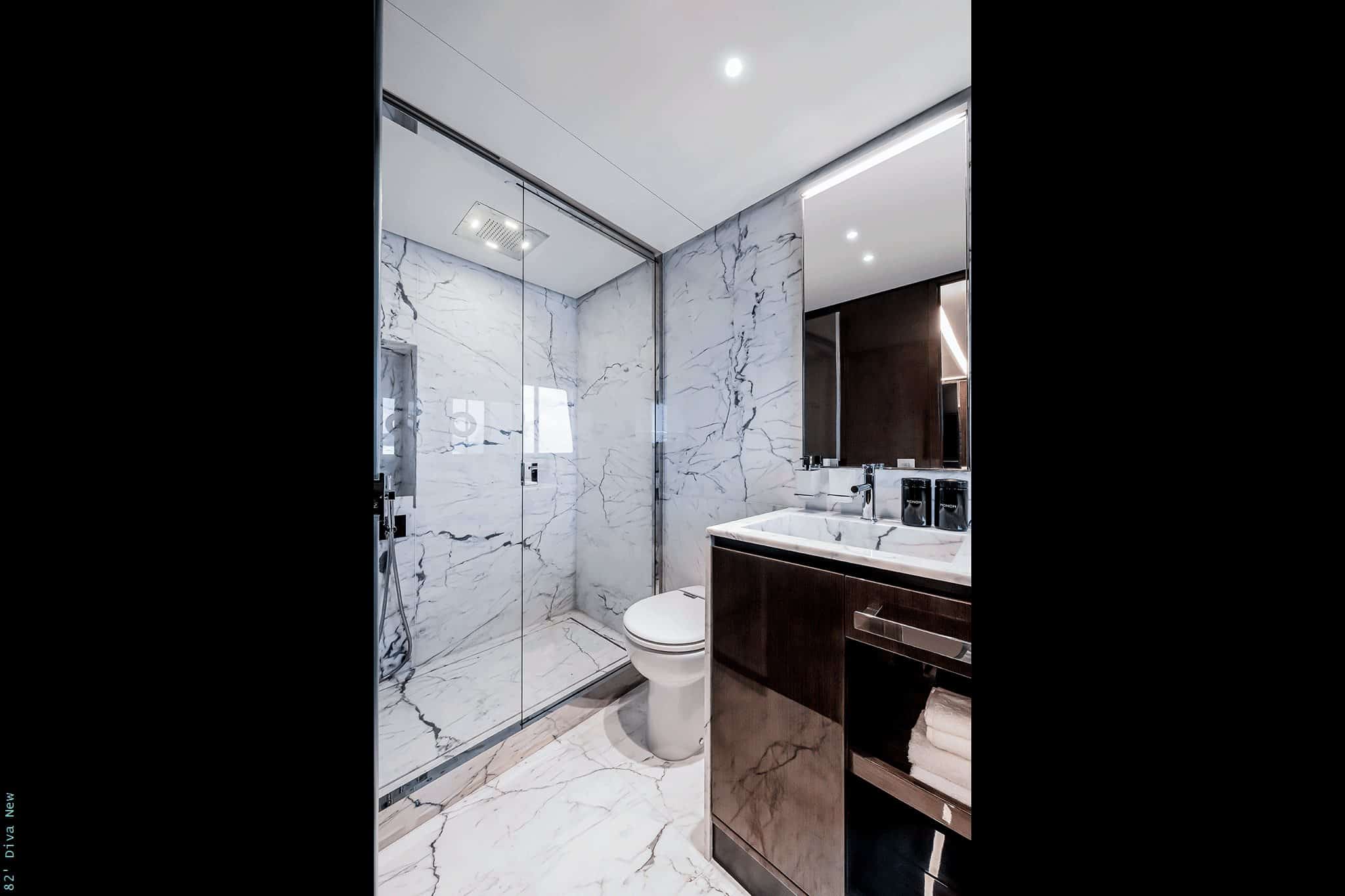 Riva 82 Diva ensuite bathroom with marble shower and dark vanity