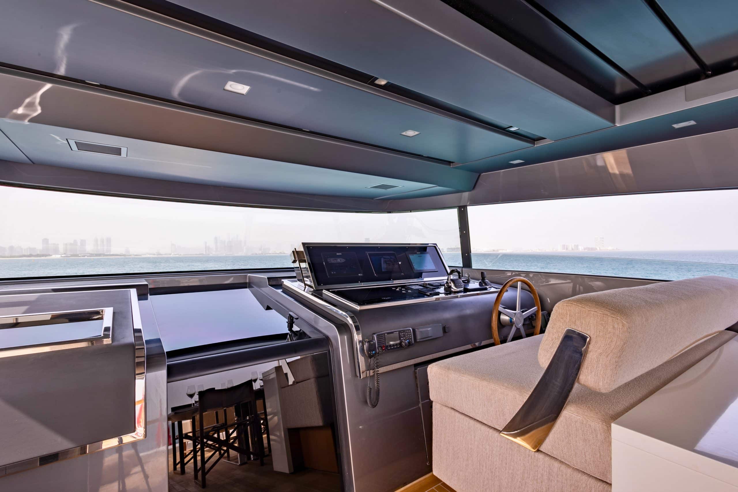 SanLorenzo SX88 flybridge helm with steering wheel and nav screens