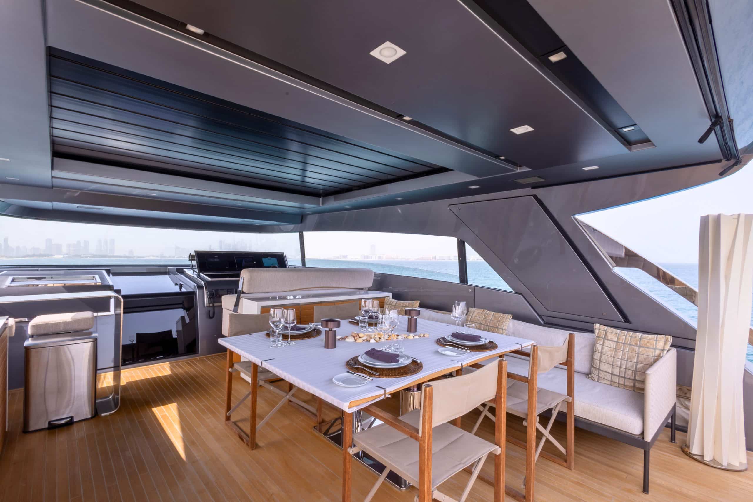 SanLorenzo SX88 main deck dining table set beside the television