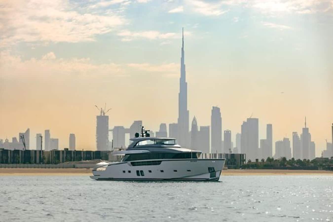 SanLorenzo SX88 profile against the Dubai skyline, broker photo