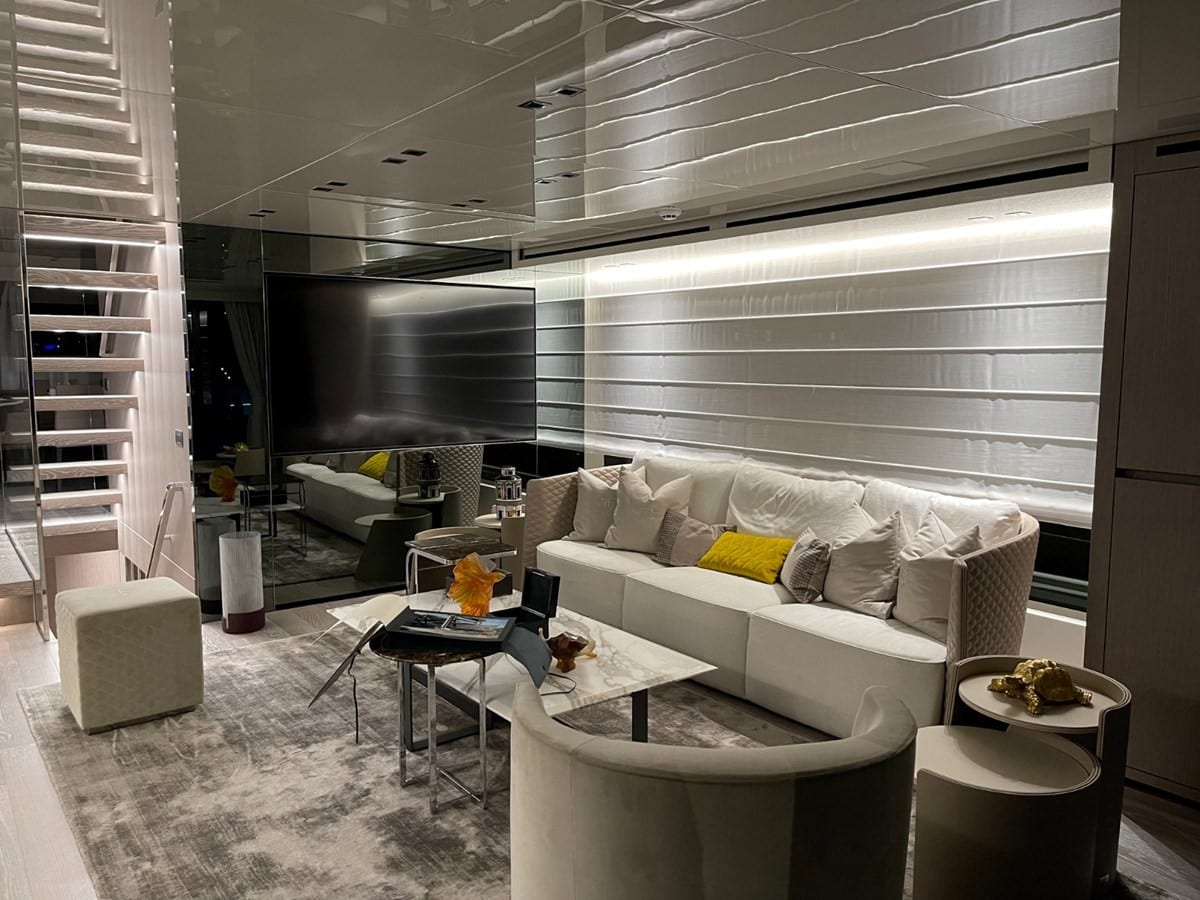 SanLorenzo SX88 main salon sofa and media wall, broker photo