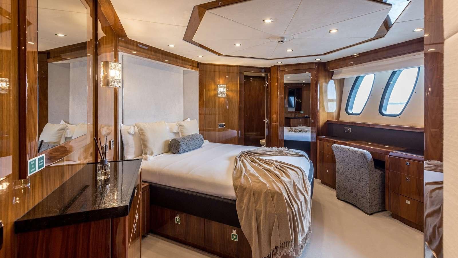 Sunseeker 37M guest cabin with TV console and vanity desk