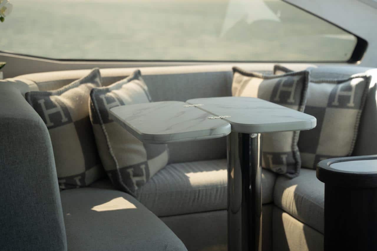 Sunseeker 82 Yacht saloon dinette with upholstered seating