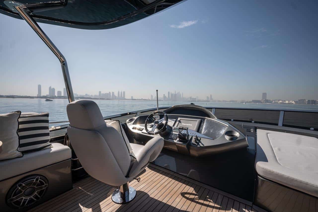 Sunseeker 82 Yacht flybridge helm seat and Raymarine console
