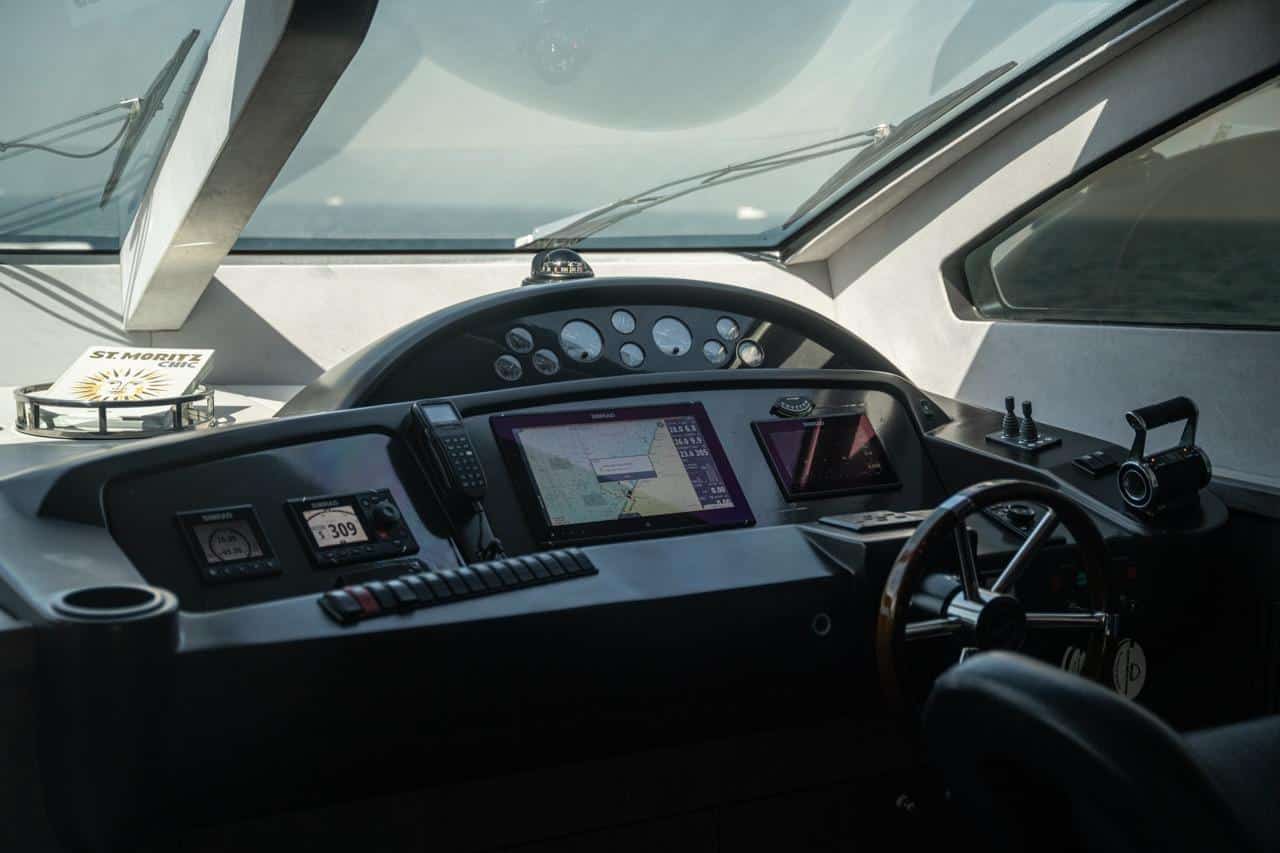 Sunseeker 82 Yacht lower helm console with navigation displays