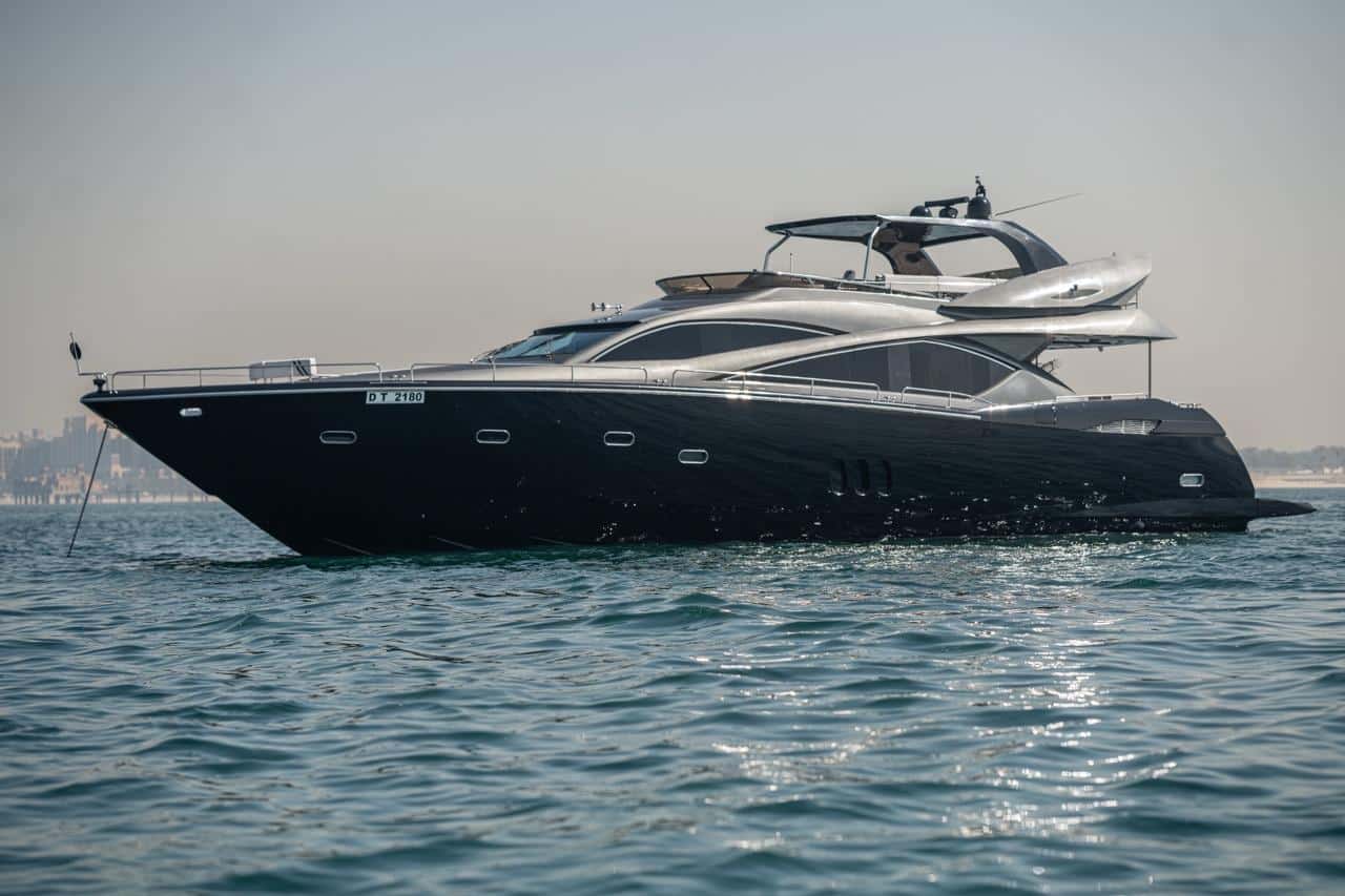 Sunseeker 82 Yacht profile at anchor, black hull after 2025 repaint