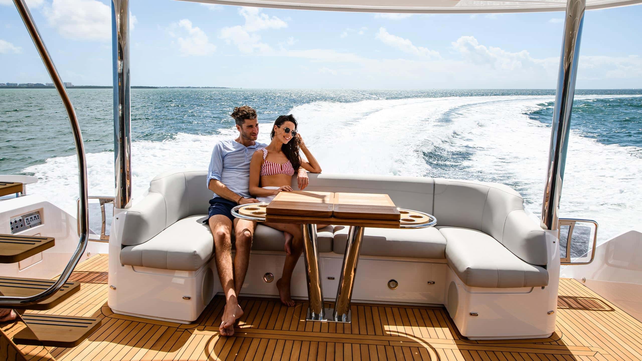 Sunseeker Manhattan 68 cockpit dining underway at sea — shipyard photo